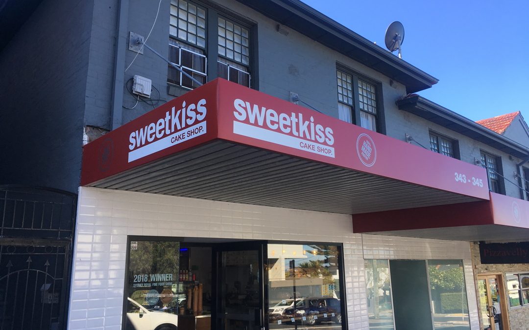 Awning signage for Sweet Kiss Cake Shop